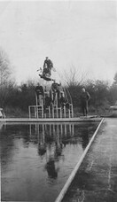 Soldiers on a diving board