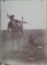 Akseli Gallen-Kallela carrying a gazelle.