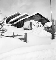 Log houses in snow, Norrboda Gammelstad, Dalarna, Sweden