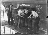 Labourers working on hull of ship, Hobart  Wharves , Tasmania (c1900s)