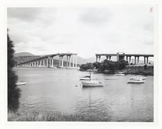 View of the Tasman Bridge from Kalatie Road Montague Bay looking toward the Powder Jetty over Cuthbertson's Boat shed (1975)