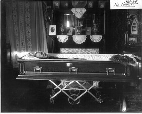Unidentified man in casket n.d.