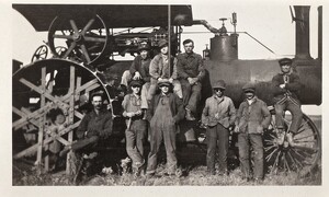 Men with Massive Steam Engine
