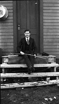 Unidentified man with rifle