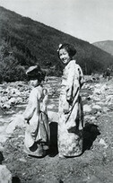 Two Japanese Canadian girls in traditional dress participating in  Bon Festival at Sandon Camp