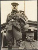 "Colonel Sam Hughes about to throw a bundle of personal letters aboard one of the transports with Colonel W. McBain, seated", Montreal Daily Star, p.9, 17 October 1914