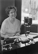 Radio announcer Kaisu Puuska (later Kaisu Puuska-Joki) in a continuity unit, 1930s.