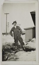 Akseli Gallen-Kallela, with a minerÂ´s lamp and clothes, visiting an iron mine in Negaunee, Michigan, 1924.