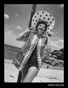 Woman modelling beach wear, 1950s