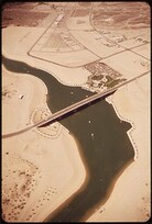 London Bridge crosses arm of Havasu Lake at Lake Havasu City. Rescued from demolition by an American buyer, the famous old span was transplanted here in 1971, May 1972