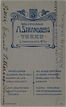 Backside of a visit card made by A. Strandberg photography studio in Turku.