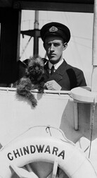 Ship's officer with pet dog on SS CHINDWARA, 1912-1933