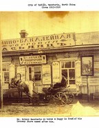 Armenian merchant outside grocery store, Hailar, Manchuria (China), c. 1915