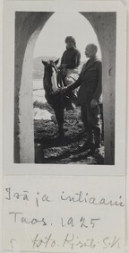 Native American Jerry on a horse and Akseli Gallen-Kallela at the Gallen-KallelasÂ´ gate in Taos, New Mexico, 1925.