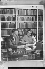 Man and young woman at table n.d.