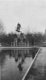 Soldiers on a diving board
