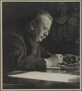 Eliel Aspelin-HaapkylÃ¤ at his desk with his wife, Ida, in the 1910Â´s.