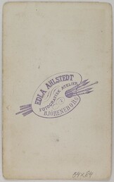Backside of a visit card made by Edla Ahlstedt photography studio in Pori in the late 19th century.