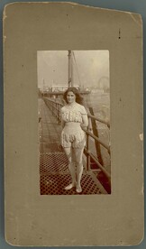 Photograph of Beatrice Kerr standing on a pier