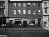 Former [Dictaphone Corp Ltd.], 124 Hollis St., showing Austen Brothers Ltd. (118-120 Hollis St.) in the background