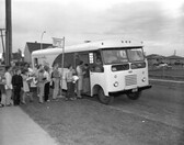Students line up for the Edmonton Public Library Book Mobile, Alberta