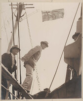 Madigan at the rail & Mawson stepping from the rail of the Aurora, 1911-1914