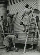 Women railway workers painting and decorating