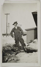 Akseli Gallen-Kallela, with a minerÂ´s lamp and clothes, visiting an iron mine in Negaunee, Michigan, 1924.