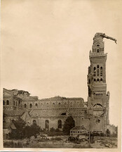 Albert Cathedral showing "Golden Virgin" hanging