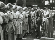 The Royal tour in the North Eastern Countries - The King chatting to some of the munitions girls