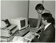 Office of Computer and Communications Systems staff configuring Grateful Med