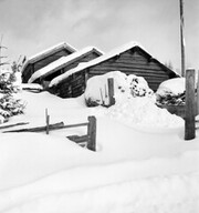Log houses in snow, Norrboda Gammelstad, Dalarna, Sweden