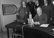 President of Finland Pehr Evind Svinhufvud in a radio studio giving a speech to honour the 10th anniversary of the Finnish Broadcasting Company, 1936.