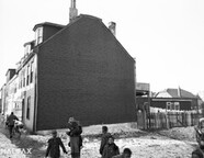 In front of 175 Creighton St. (empty lot)