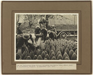Photograph - 2nd Australian Siege Battery unloading big shells from a motor lorry, Voormezeele, Belgium