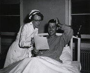 U.S. Naval Hospital, Bainbridge, MD: Nurse helps patient choose from menu
