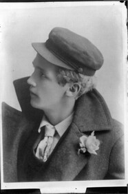 Portrait photograph of young man in overcoat n.d.