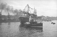 The tanker 'Gomphina' under tow on the River Wear