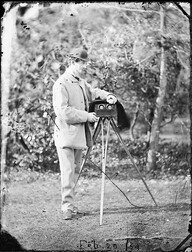 Lord Dunlo in garden with stereo camera