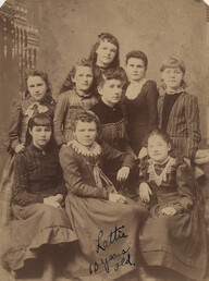 Portrait of teacher and students, 1857