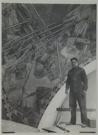 Jorma Gallen-Kallela standing by the Kalevala cupola fresco The Defence of the Sampo in the National Museum of Finland, 1928.