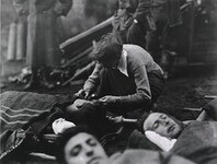 U.S. Army Evacuation Hospital Nos. 6 & 7, Souilly, France, Red Cross worker Miss Anna Rochester, of the Smith College Unit, ministering to the wounded