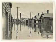 Flooded street and houses, possibly Goodwin Street, Invermay (1929)