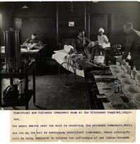 Electrical and Galvanic treatment room at the Kitchener Hospital, Brighton. Photographer: H. D. Girdwood.