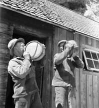 Farm workers at a drinking pause, Lilla KarlsÃ¶ island, Gotland, Sweden