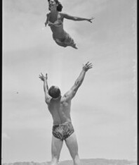 Acrobatics at the beach by two Tivoli stars, December 1951