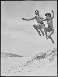 Acrobatics at the beach by two Tivoli stars, December 1951.