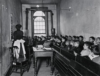"A Class in the Condemned Essex Market School, With the Gas Burning by Day"