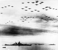 Surrender of Japan, 2 September 1945  Navy carrier planes fly in formation over the U.S. and British fleets in Tokyo Bay during surrender ceremonies.