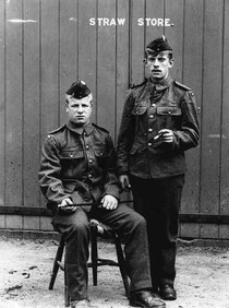 Soldiers seated & standing circa 1914 (archive ref DDX1319-1-22)